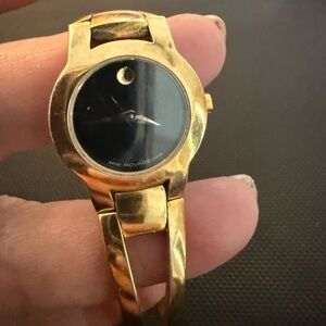 Movado Gold and Black Bracelet Woman’s Watch